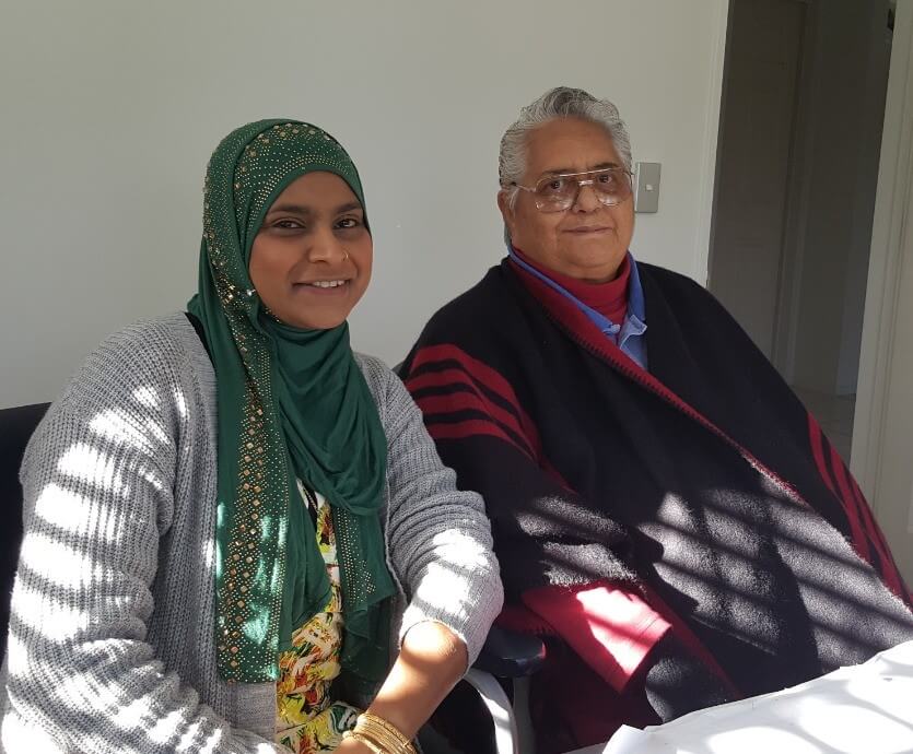 A volunteer visiting her client